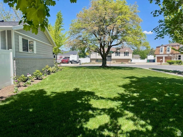 1460 E Amalfi Ave, Sandy, UT 84093 - view of green lawn featuring a residential view