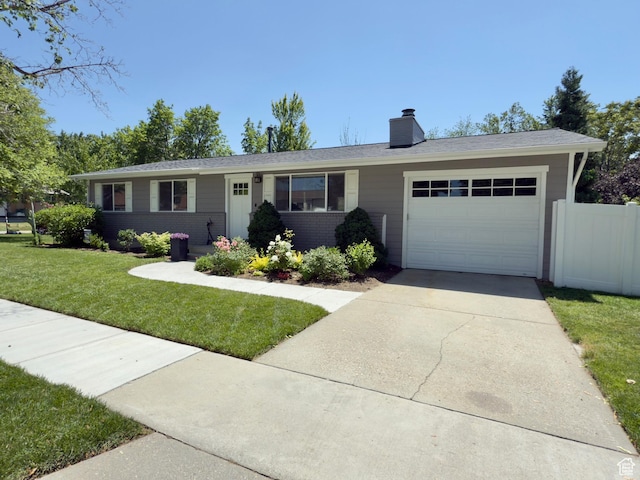 1460 E Amalfi Ave, Sandy, UT 84093 - ranch-style home with a garage, driveway, a chimney, and brick siding