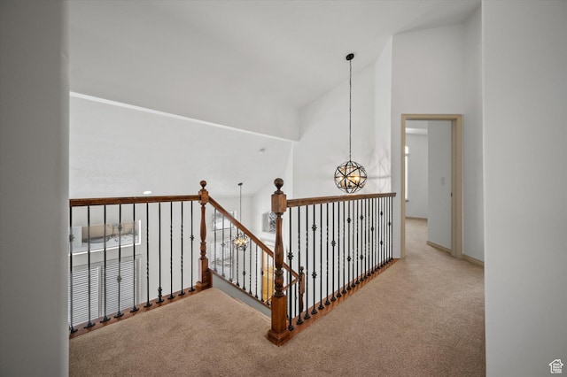 1952 E Meadow Downs Way, Cottonwood Heights, UT 84121 - hall featuring an upstairs landing, an inviting chandelier, lofted ceiling, and carpet