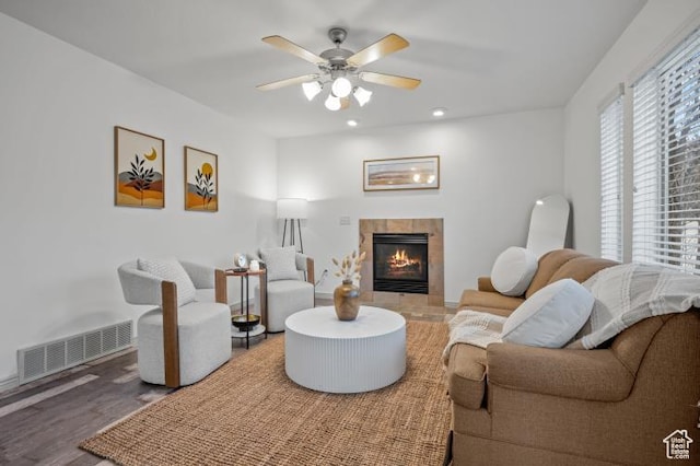 1952 E Meadow Downs Way, Cottonwood Heights, UT 84121 - living room featuring visible vents, wood finished floors, a ceiling fan, and a tile fireplace