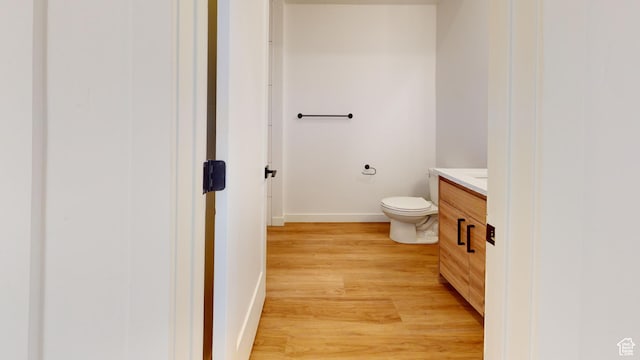 1266 S Sawmill Blvd Unit 3-303, Heber City, UT 84032 - bathroom featuring toilet, vanity, and wood-type flooring