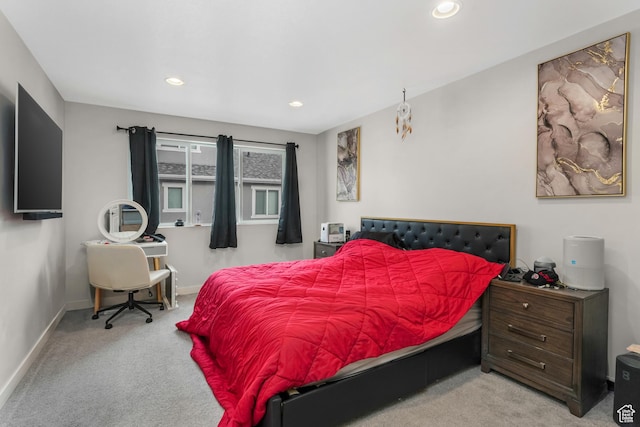bedroom with light carpet