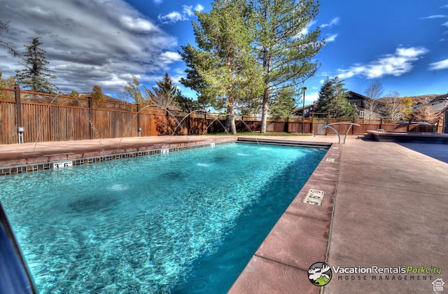 2015 Prospector Ave Unit 106, Park City, UT 84060 - view of pool featuring pool water feature and a patio