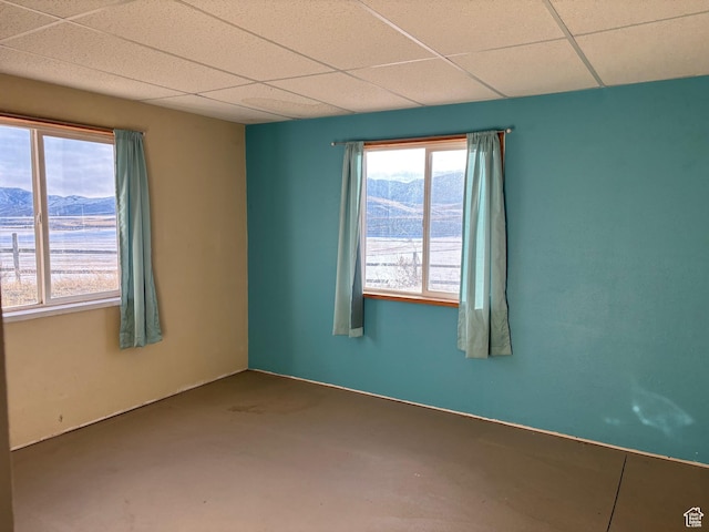 4981 N Daniels Rd, Malad City, ID 83252 - unfurnished room with a drop ceiling and a mountain view