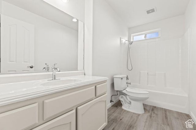 1305 E Riverside Dr Unit 1, St George, UT 84790 - full bathroom featuring toilet, vanity, wood finished floors, bathing tub / shower combination, and baseboards