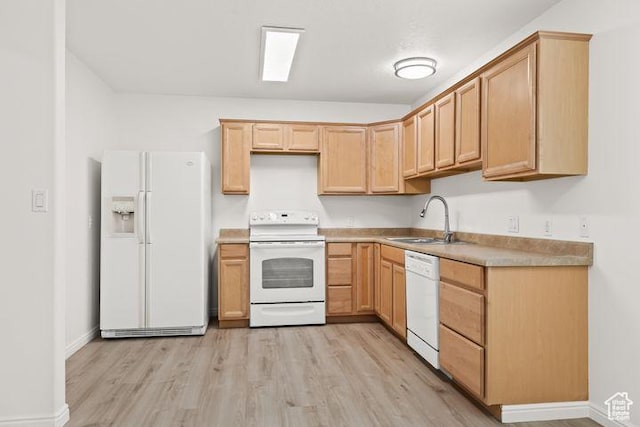 1305 E Riverside Dr Unit 1, St George, UT 84790 - kitchen featuring white appliances, a sink, light wood-style flooring, light brown cabinets, and light countertops