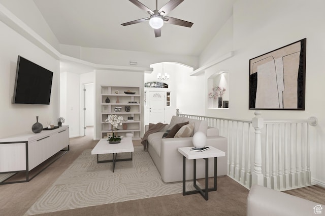 1305 E Riverside Dr Unit 1, St George, UT 84790 - living area featuring light carpet, a ceiling fan, vaulted ceiling, arched walkways, and a chandelier