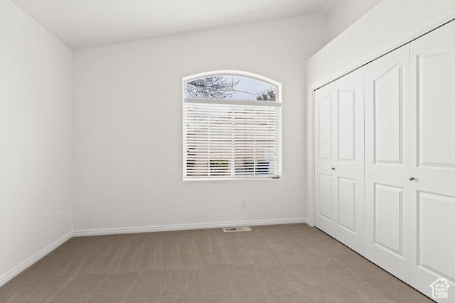 1305 E Riverside Dr Unit 1, St George, UT 84790 - unfurnished bedroom featuring carpet flooring, a closet, and baseboards