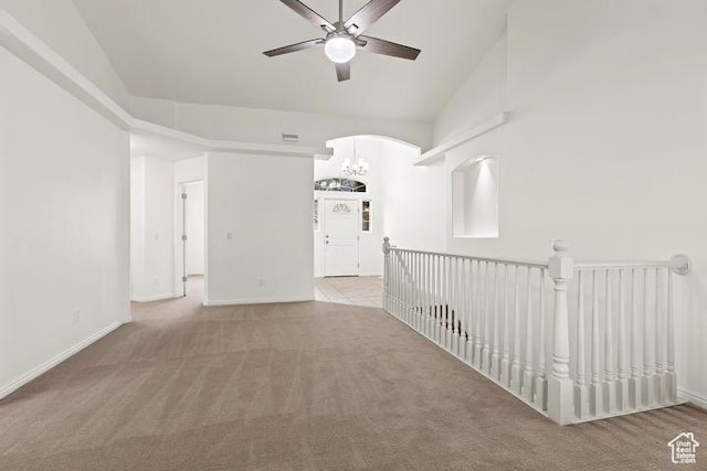 1305 E Riverside Dr Unit 1, St George, UT 84790 - unfurnished room featuring carpet flooring, a ceiling fan, vaulted ceiling, baseboards, and arched walkways