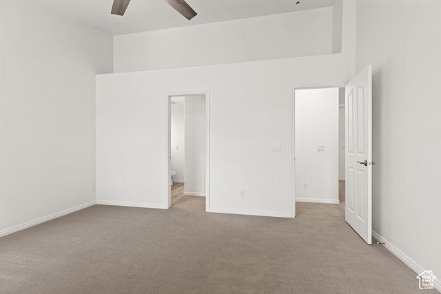1305 E Riverside Dr Unit 1, St George, UT 84790 - unfurnished bedroom featuring carpet floors, baseboards, and a ceiling fan