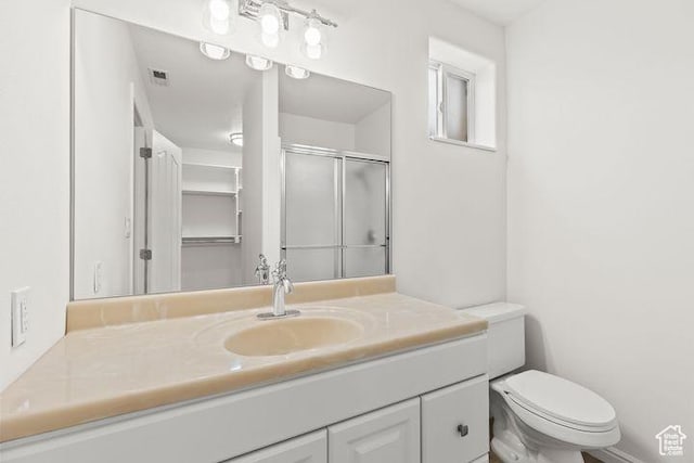 1305 E Riverside Dr Unit 1, St George, UT 84790 - full bathroom featuring toilet, vanity, and an enclosed shower