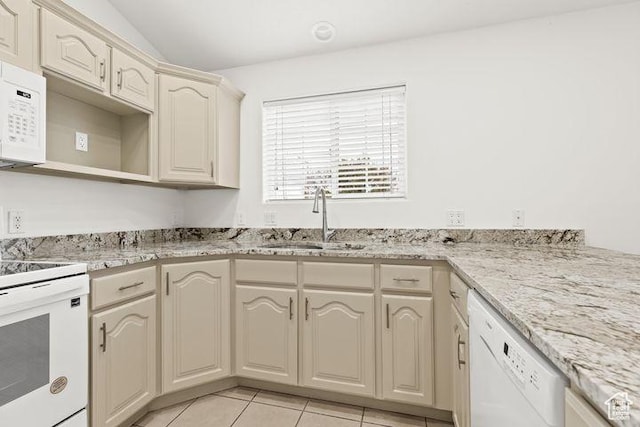 1305 E Riverside Dr Unit 1, St George, UT 84790 - kitchen featuring white appliances, a sink, cream cabinetry, light tile patterned flooring, and light stone countertops