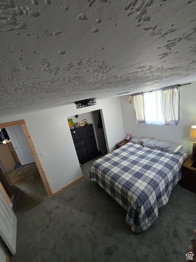 19 Sumac Way, Brigham City, UT 84302 - bedroom featuring baseboards, carpet floors, and a textured ceiling