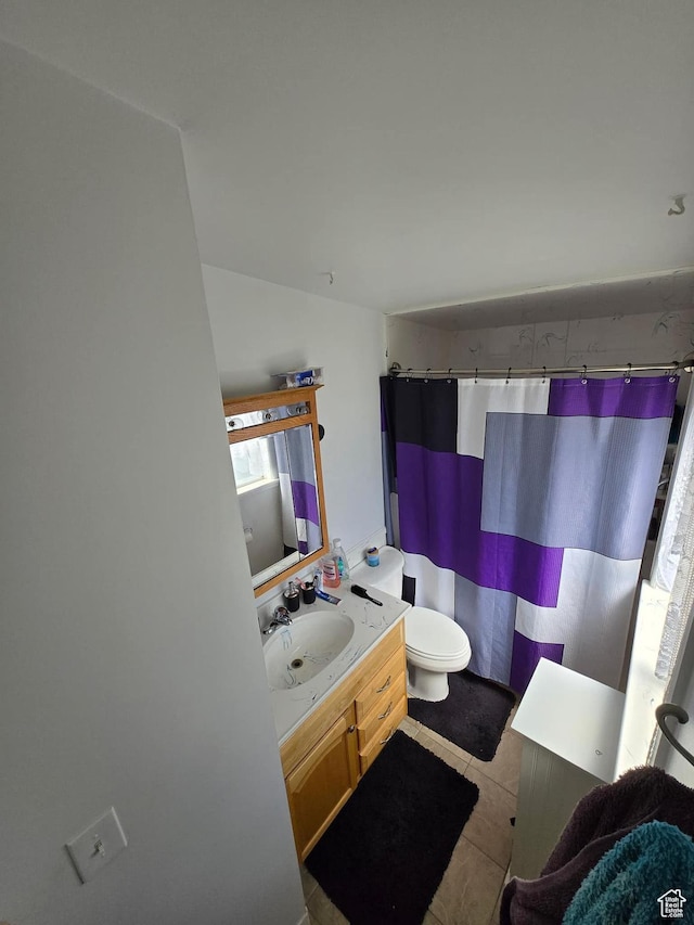 19 Sumac Way, Brigham City, UT 84302 - bathroom featuring curtained shower, toilet, vaulted ceiling, tile patterned floors, and vanity