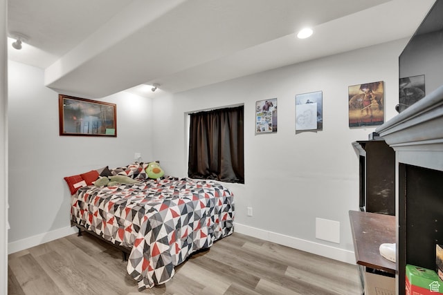 bedroom featuring light hardwood / wood-style flooring