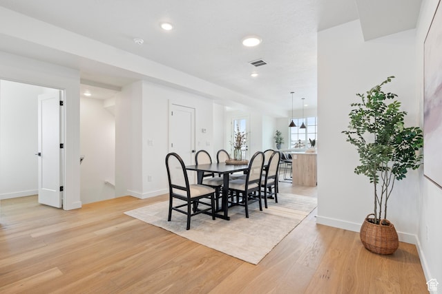 dining area featuring light hardwood / wood-style floors