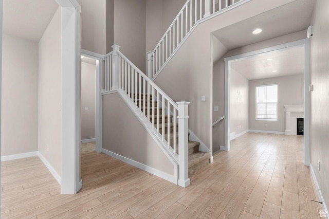 1282 E Clipper Peaks, Eagle Mountain, UT 84005 - stairway with hardwood / wood-style flooring
