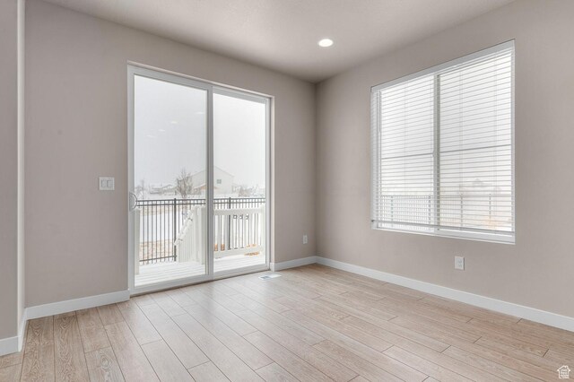 1282 E Clipper Peaks, Eagle Mountain, UT 84005 - empty room with light hardwood / wood-style floors