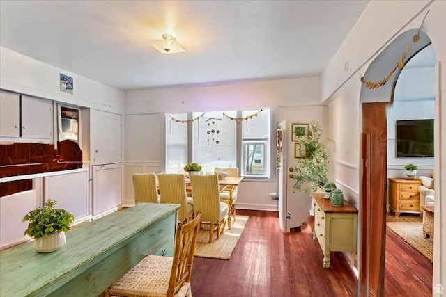 dining room with wood finished floors