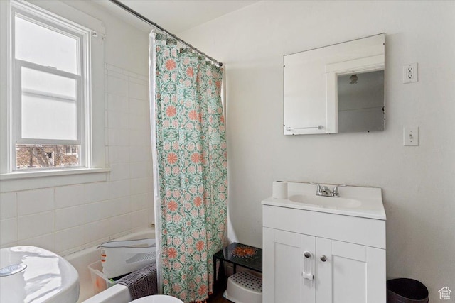 full bath featuring shower / bath combo and vanity