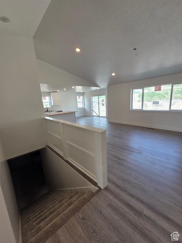640 S 1030 E, Smithfield, UT 84335 - kitchen featuring a peninsula, dark wood finished floors, white cabinets, recessed lighting, and baseboards