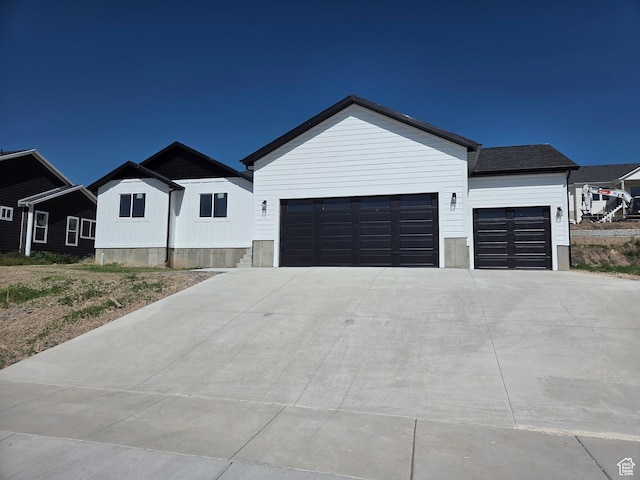 640 S 1030 E, Smithfield, UT 84335 - view of front of home with an attached garage and concrete driveway