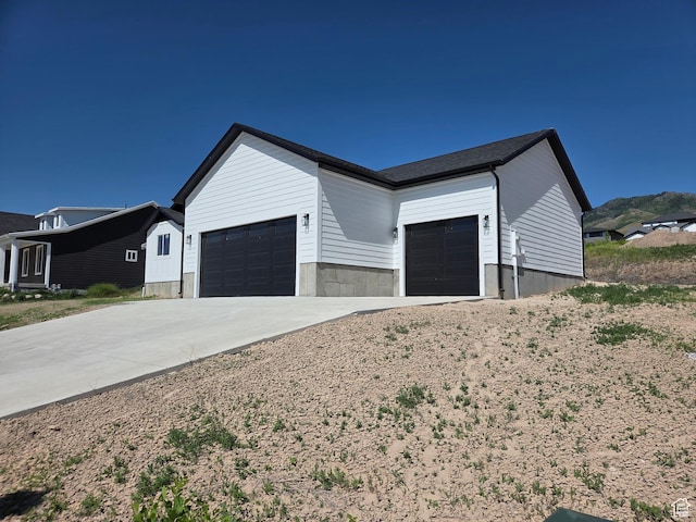 640 S 1030 E, Smithfield, UT 84335 - view of front of property with a garage and driveway