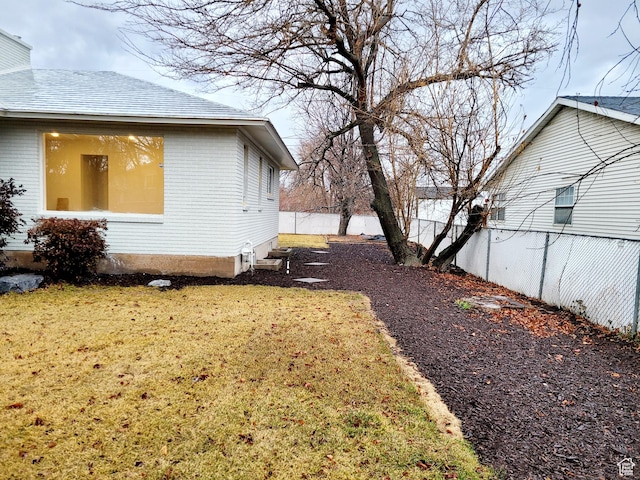 view of yard featuring a fenced backyard