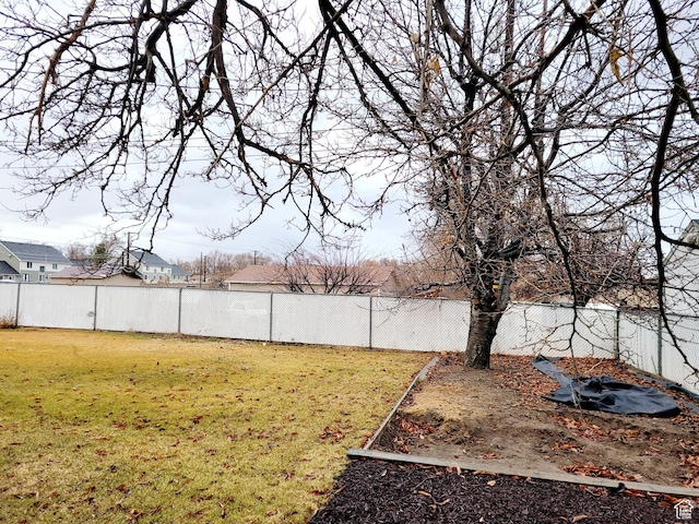 view of yard featuring a fenced backyard