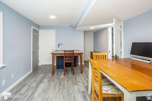 dining area featuring hardwood / wood-style floors