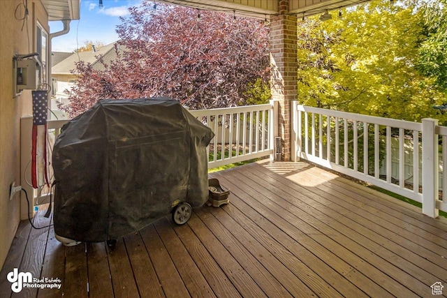 deck featuring a grill
