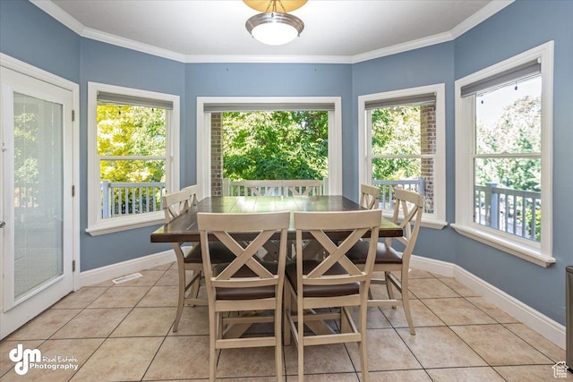 tiled dining space featuring ornamental molding
