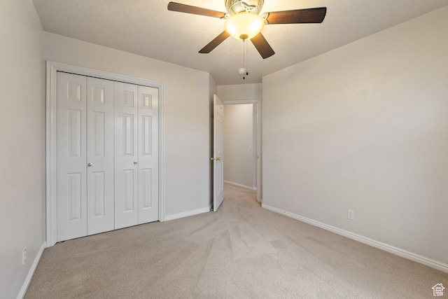1040 S 1100 E Unit 85, St George, UT 84790 - unfurnished bedroom with a closet, ceiling fan, and light colored carpet