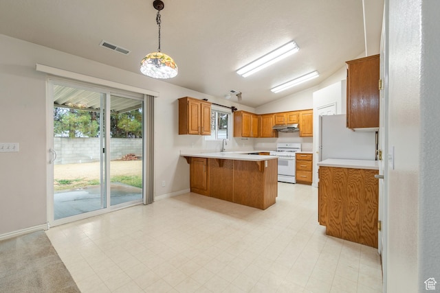 1040 S 1100 E Unit 85, St George, UT 84790 - kitchen featuring pendant lighting, plenty of natural light, white gas range oven, and kitchen peninsula