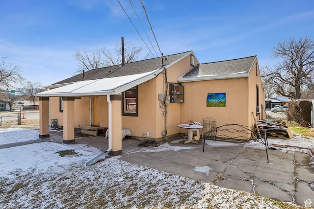 804 W 600 N, Salt Lake City, UT 84116 - snow covered rear of property with a patio