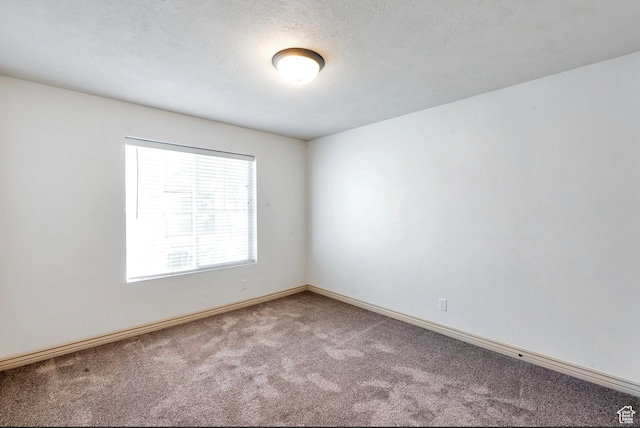 289 S 1000 W Unit 203, Pleasant Grove, UT 84062 - carpeted spare room featuring a textured ceiling