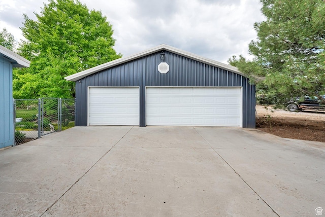 detached garage with fence