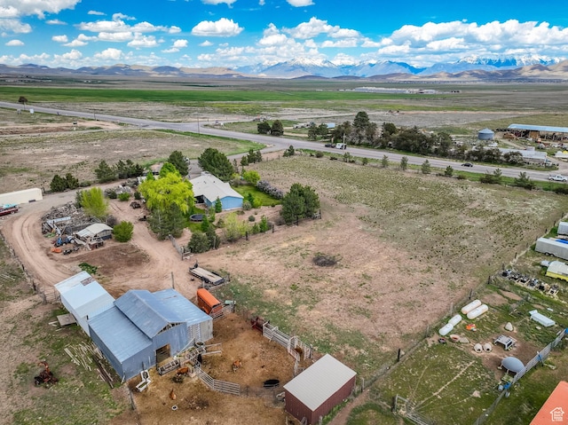 aerial view of sparsely populated area with mountains