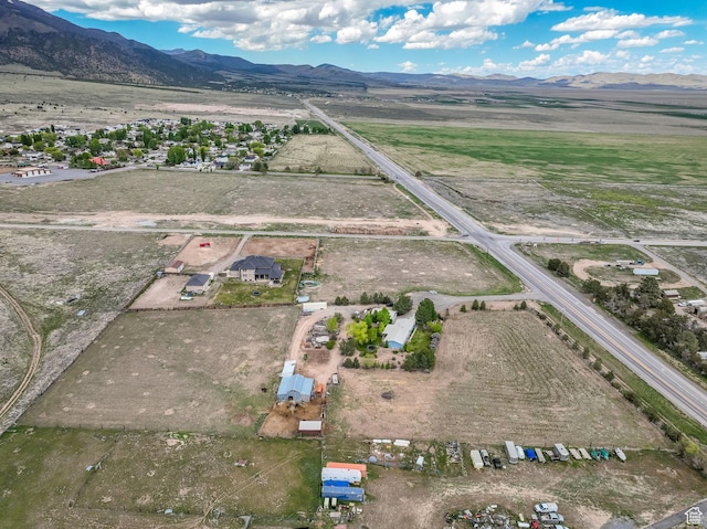 aerial view of sparsely populated area featuring mountains