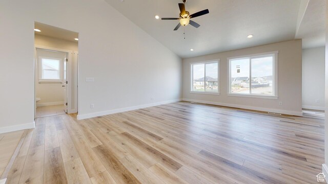 9270 N 5600 W Unit 7, Elwood, UT 84337 - unfurnished room with high vaulted ceiling, recessed lighting, a ceiling fan, baseboards, and light wood-style floors