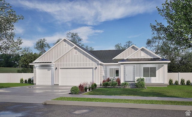 view of front of home with a front lawn, board and batten siding, and fence