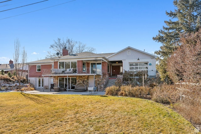 5419 S Kenwood Dr E, Salt Lake City, UT 84107 - rear view of property featuring a patio area, a ceiling fan, a lawn, a chimney, and stone siding
