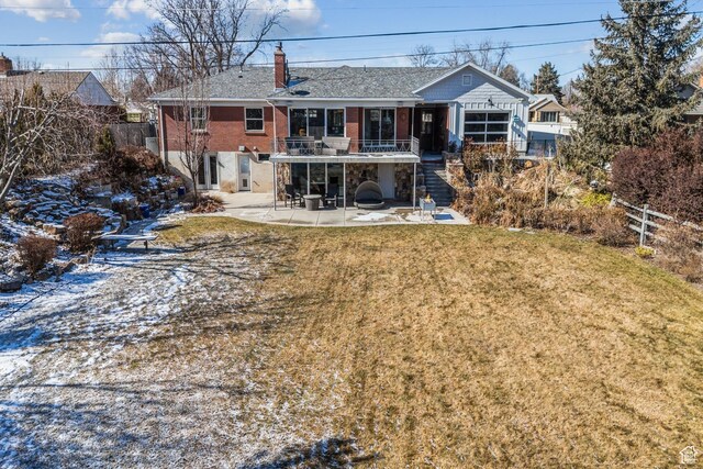 5419 S Kenwood Dr E, Salt Lake City, UT 84107 - back of house featuring a patio area, stairs, brick siding, a chimney, and a shingled roof