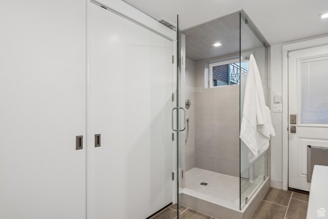 5419 S Kenwood Dr E, Salt Lake City, UT 84107 - bathroom with a stall shower and tile patterned floors