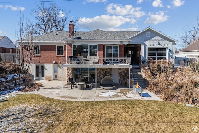 5419 S Kenwood Dr E, Salt Lake City, UT 84107 - back of house featuring stairway, a patio, a chimney, brick siding, and roof with shingles