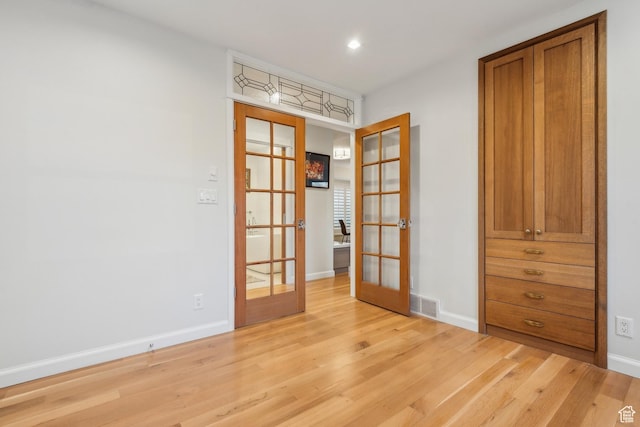 5419 S Kenwood Dr E, Salt Lake City, UT 84107 - empty room with french doors, light wood-style flooring, baseboards, and recessed lighting
