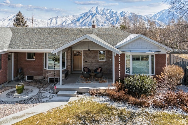 5419 S Kenwood Dr E, Salt Lake City, UT 84107 - single story home featuring a shingled roof, a mountain view, brick siding, and a chimney