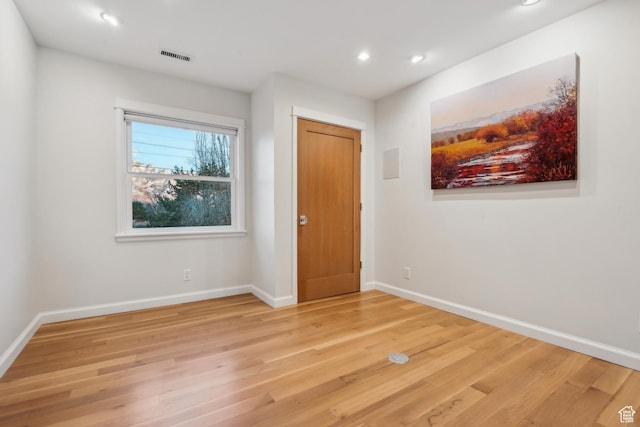 5419 S Kenwood Dr E, Salt Lake City, UT 84107 - unfurnished bedroom with light wood-style flooring, recessed lighting, and baseboards