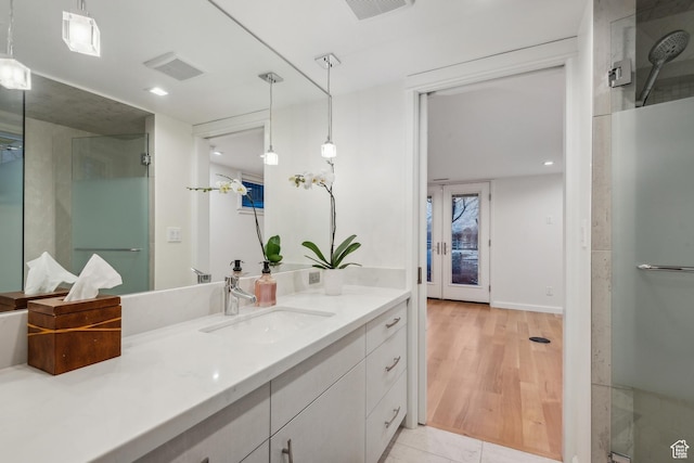 5419 S Kenwood Dr E, Salt Lake City, UT 84107 - full bathroom featuring vanity, a stall shower, baseboards, and recessed lighting