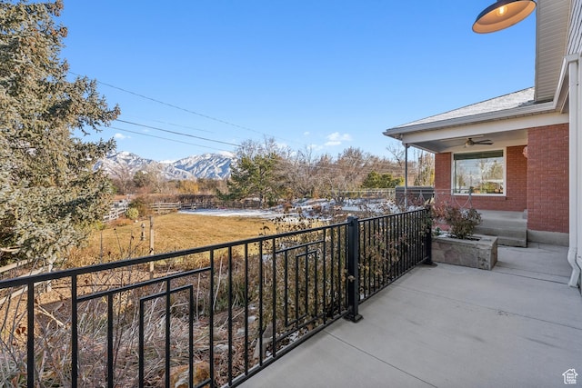 5419 S Kenwood Dr E, Salt Lake City, UT 84107 - porch with ceiling fan and a mountain view